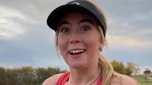 Grace Charis suffers major wardrobe malfunction as she plays golf and says  'it's cold'... as fans reply 'Oh we can tell'