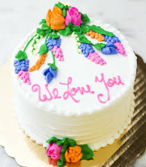 Butter Icing Birthday Cake For Mother White Mother S Day Cake With Beautiful Flowers Designed On Top Cake 008 Mother Sday Mothers Day Cake Cake Flower Cake