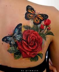 Amazing 3d butterfly flower tattoo on foot for girls. Tattoo Ideas Central Butterfly Tattoo Designs Rose And Butterfly Tattoo Butterfly Back Tattoo