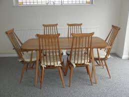 Maybe you would like to learn more about one of these? Antiques Atlas Ercol Plank Table Goldsmith Chairs 4 2 Carvers