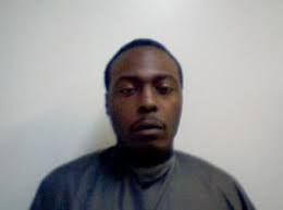 Armed robbery suspect at large |