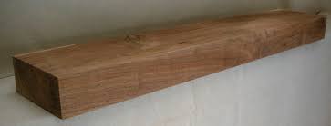 Live edge walnut mantel our walnut mantels have a beautiful dark tone that goes well with grays and white. Log Fireplace Mantels Kettle Moraine Hardwoods Inc