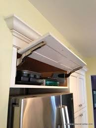 30 Diy Space Saving Hacks To Organize Your Kitchen Kitchen Cabinet Storage In 2020 Kitchen Cabinet Storage Solutions Refrigerator Cabinet Kitchen Cabinet Storage