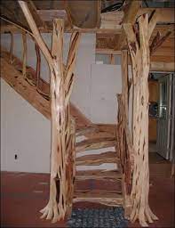 One way to enhance the look of your porch is to wrap your porch with cedar clad common posts. Trees As Porch Columns Staircase Made With Mountain Cedar Posts And Slabs By Mueller Sawmill Rustic Stairs Log Cabin Interior Log Cabin Decor