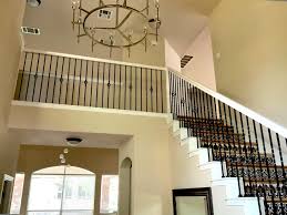 Our handrail profiles of over 35 styles provide plenty of options from which to choose and each style is available in 14 standard and custom wood species, and additional species can be quoted. White Interior Stair Handrail Painting Surepro Painting