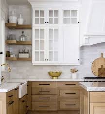 A Winning Combination The Natural Wood Drawers And Shelves Compliment The Clean White Cabinets Kitchen Cabinet Trends White Oak Kitchen Home Decor Kitchen