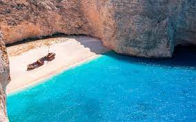 The cliff top viewpoint above naviago is almost an naviago beach is surrounded by marble white cliffs meaning the beach and the shipwreck can only be accessed by boat. Work To Start On The Zakynthos Shipwreck Greece Is