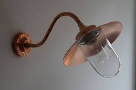 koperen stallampen eigen fabricaat in showroom en webshop koper buitenlampen buitenverlichting