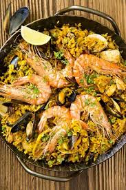 Spanish Paella De Marisco Recipe Seafood Paella Foodal Recipe Paella Paella Recipe Paella Recipe Seafood