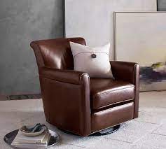 Dust or vacuum for routine maintenance. Irving Roll Arm Leather Swivel Glider Pottery Barn