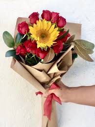 12 Roses 1 Sunflower In The Middle Hand Wrapped Bouquet In Placentia Ca Orchids Little Secret Boutique