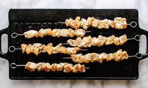 How to cook chicken skewers without a grill. Easy Chicken Kabobs In The Oven Pinch And Swirl