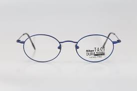 Nikon Dura Titan 0255 T A C T Tc 6208 Titanium Vintage 90s Blue Small Oval Eyeglasses Frames Mens Women Nos In 2021 Vintage Eyeglasses Frames Oval Eyeglasses Vintage Eyeglasses