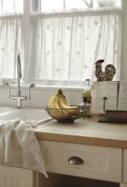 Find furniture & decor you love at hayneedle, where you can buy online while you explore our room designs and curated looks for tips, ideas & inspiration to help you along the way. White Window Curtains With Texture For Kitchen Kitchen Window Treatments Kitchen Window Curtains Cafe Curtains