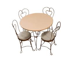 This is a whimsical ice cream table that is sure to strike any audience. Vintage Wrought Iron Ice Cream Parlor Set