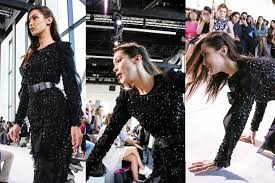 Bella hadid goes sneaker shopping with complex. Bella Hadid Gets Knocked Down But She Gets Up Again From The Runway Vanity Fair