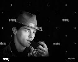 Pipe smoking vintage Black and White Stock Photos & Images