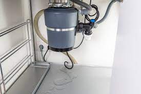 Water on the bottom of the kitchen sink cabinet could mean a leak in one of the faucet hoses, the sink drain assembly or the dishwasher drain connections. Garbage Disposal Leaking From Bottom Here S How To Repair Pph