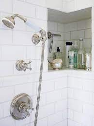 24 Smart Ways To Store More In Your Bathroom Shower Storage Shower Niche Clever Bathroom Storage