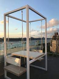 Around the cafe perimeter walls, there are some seating benches that change into a comfortable couch with shelves and pillows. Etsy Selling Swing Tables You Can Assemble In Under An Hour