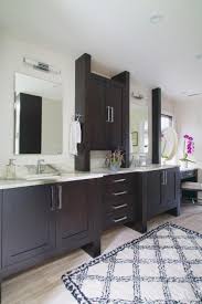 Beautiful bathroom features a dark gray vanity topped with carrera. Master Bath With Dark Vanity Cabinet And Marble Countertop Hgtv