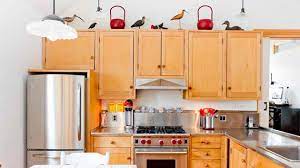 I like to use items sparingly to still have. How To Decorate The Top Of Kitchen Cabinets Home Design Lover