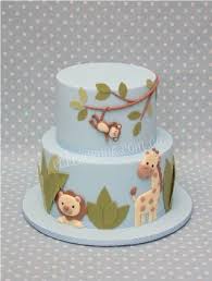 Featuring a gorgeous pastel rainbow tea table that's decked out with decadent treats and darling decor, this celebration is full of things to adore! Jungle Cake Animal Baby Shower Cake Shower Cakes Baby Cake