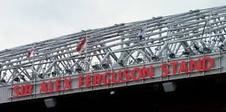 Purchased at sir alex ferguson stand. Six Alex Ferguson Stand The Flags Above The Stand Represent The Countries Of The Players Wi Manchester United Stadium Manchester United Football Museum Tours