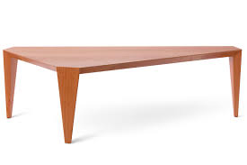 A simple square with setback square legs, the origami table has a several variations, each after a folded paper shape, but geometrically designed so that the aerial view is always a square. Origami Coffee Table Angela Adams Handcrafted Modern Furniture