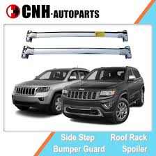 2021 jeep grand cherokee with a thule flush rail roof rack, a thule portage canoe carrier, and a thule upride roof mounted wheel on bike carrier. China Stainless Steel Roof Rack Cross Bar For Jeep Grand Cherokee 2011 2014 2019 China Cherokee Roof Racks