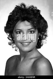 FILE ** In this Jan. 29, 2008 file photo, home theater salesperson Justin  Standish, left, helps a customer with information