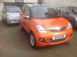 Image result for Orange 2011 Aixam-Mega