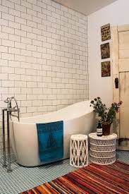 Little Luxury 30 Bathrooms That Delight With A Side Table For The Bathtub With Images Eclectic Bathroom Eclectic Bathroom Design Bathroom Design