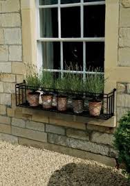 Window boxes let you express your creativity and style without a lot of work and they help to make your home seem more friendly and inviting. 15 Wrought Iron Window Boxes Ideas Wrought Iron Window Boxes Window Boxes Window Box