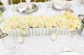 Flowers add color to a setting's ambiance and this article will suggest a few flower arrangement ideas that will make your valentine's day even more special than it already is. Elegant White Outdoor Dinner Party Kara S Party Ideas Outdoor Dinner Parties Dinner Party Dinner