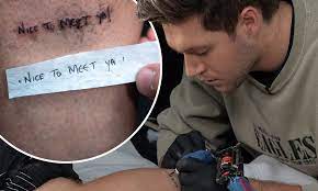 Watch niall horan freak out over getting his first tattoo. Niall Horan Tattoos Roman Kemp S Leg And Makes A Typo Daily Mail Online