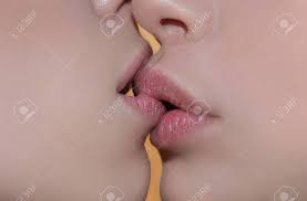 Boca De Niña De Lengua, Concepto De Mujer. Beso Francés. Sexo Oral A Dos  Mujeres. Beso Sensual En Pareja Del Mismo Sexo De Cerca. Gusto Y Amor  Corporal Para Mujeres, Entre Niñas,