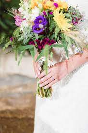 Ceremony decorations, reception decorations and center pieces: Yellow And Purple Wildflower Wedding Bouquet In 2020 Wildflower Wedding Wildflower Wedding Bouquet Wedding Bouquets