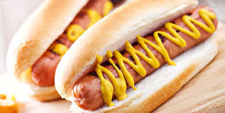 A hot dog (also spelled hotdog) is a food consisting of a grilled or steamed sausage served in the slit of a partially sliced bun. American Hot Dog Styles 9 Types Of Hot Dogs From U S Cities