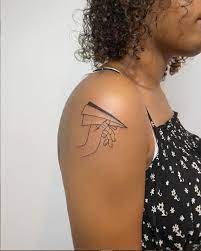 Tattoo Design And Implication Of Paper Airplane Lily Fashion Style In 2020 Tattoos Tattoo Lettering Paper Airplane Tattoos