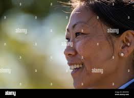 U.S. Air Force Col. Melissa Dooley, Defense Health Agency Sacramento Market  director and 60th Medical Group commander, smiles during the DHA Sacramento  Market change of directorship and the 60th Medical Group change