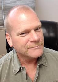 THE HOLMES SPOT: Mike Holmes Bio