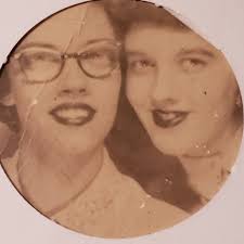 My mother and my sister.This was not prearranged to do the same pose.They  were looking through photos and put the two together.My mother is in the  1940's and my sister 1960's.