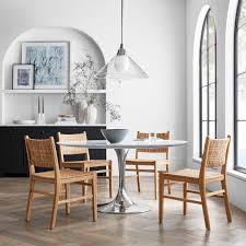 Expandable dining table mechanism of high quality completely made of lacquered metal. Tulip Pedestal Dining Table Williams Sonoma