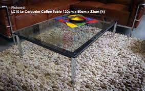 Designed by le corbusier in 1924 manufactured by cassina the table has a thick glass top which rests on a mat black frame with. Iconic Interiors Lc10 Coffee Table