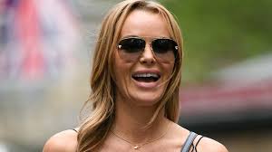Amanda Holden sashays in skinny jeans and slinky strappy top