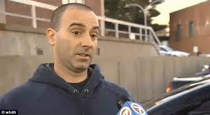 Who put SECOND GRADERS up to staging Ferguson protest? Cop accuses the  school of being 'anti-police'