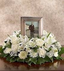 Decorating A Memorial Table Ehow Funeral Floral Arrangements Funeral Flower Arrangements Funeral Floral