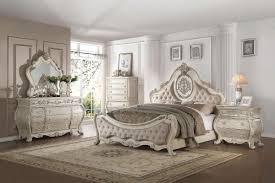 Featuring an antique white finish, the intricately carved accent details and matching tufted leather embellishment offers a noble beauty that is regal. Beige Fabric Antique Taupe Queen Bedroom Set 4p Chelmsford 26050q Acme Classic Chelmsford 26050q Set 4