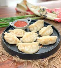 Vegetarian Momo Recipe Steamed Dumplings A Street Food From The North East India Recipe Street Food Food Momos Recipe